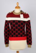 A Gucci sweater in navy and red with gold collar and buttons, size XS and a Gucci cardigan in navy