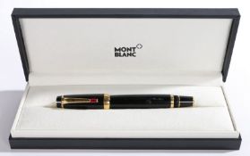A Montblanc Boheme Rouge ballpoint pen, the polished black body with gilt mounts and red paste set