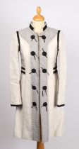 A Chloe cotton canvas light weight coat with striped front panel and navy fabric covered buttons.