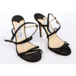 A Pair of Jimmy Choo black leather stiletto strappy heels size 35.5