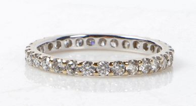 An 18 carat white gold and diamond full eternity ring, ring size I 1/2, 1.2g