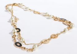 A Bulgari necklace, the gilt chain-link necklace with gilt, black and cream enamel decorated pierced