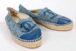 A pair of Chanel blue tweed flat espadrilles with leather CC logo and toe cap, size 36.