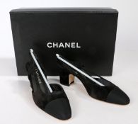 A pair of Chanel suede black suede slingback shoes with block heel and satin toe cap, unworn with