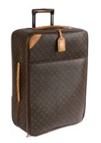 A Louis Vuitton suitcase, with monogrammed leather exterior and collapsible handle, 45cm wide,