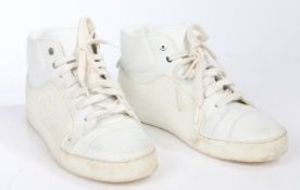 A pair of Chanel white leather high-top trainers with CC monogram, size 35.5.