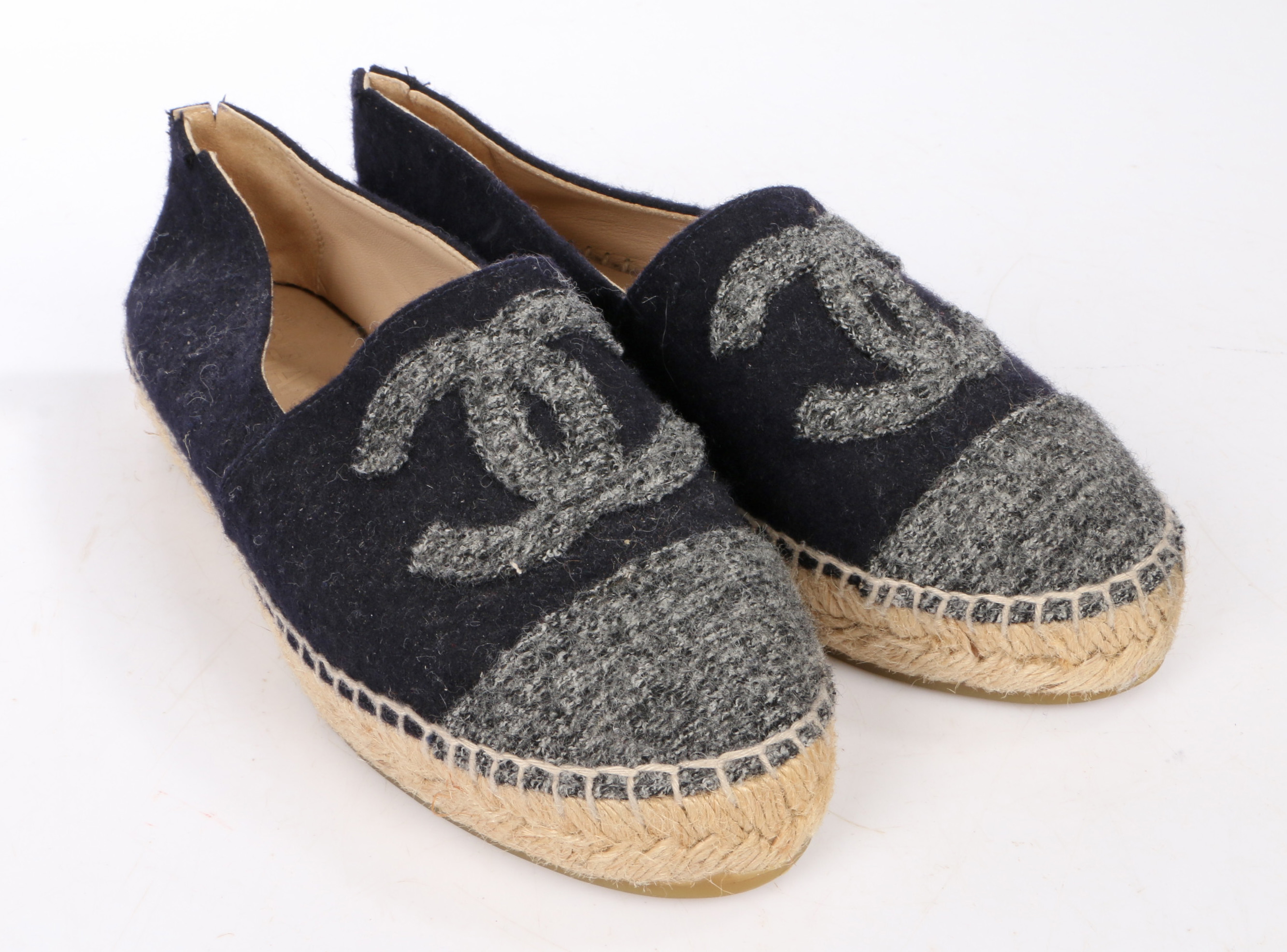 A pair of Chanel black & grey wool espadrille slip on shoes with beige leather lining. Size 35