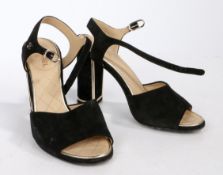A pair of Chanel block heeled suede leather open toed sandals, size 35.5.