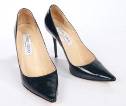 A pair of Jimmy Choo black patent stiletto heels, size 34.5.