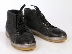 A pair of Chanel dark grey boucle wool lace up ankle boots with crepe sole and patent leather trim