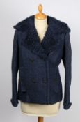 A Chanel blue wool short pea-coat, double breasted with cut wool collar and imitation jet buttons.