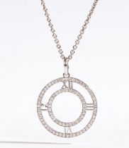 In the style of Tiffany & Co. An 18 carat white gold and diamond "Atlas" pendant necklace, the