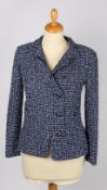 A Chanel bouclé blue & white flecked wool single-breasted jacket with round buttons, Size 36