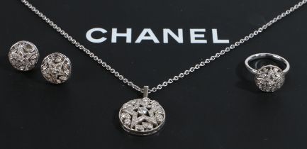 A Chanel Etoile Comete 18 carat white gold and diamond jewellery suite, consisting of a pendant