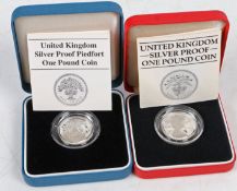 Two Royal Mint piedfort silver proof one pound coins, 1981 and 1987, cased with certificates (2)