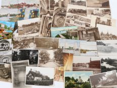 A collection of 20th Century postcards, to include black and white postcards, cigarette and tea