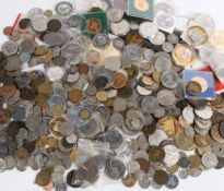 A collection of commemorative and other world coins and medallions, to include oversized replica