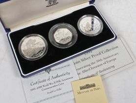 A Royal Mint 1994 three coin silver proof collection commemorating the 50th anniversary of the