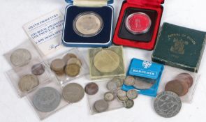 A collection of coins, to include a Canada silver dollar, a Charles and Diana silver Crown,
