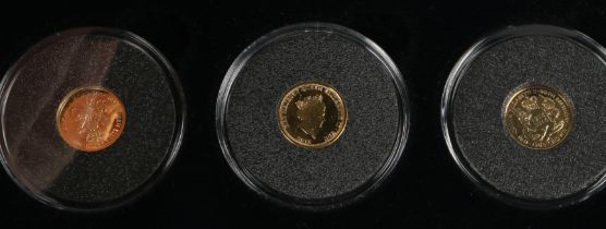 A Jubilee Mint the Royal birthdays solid 9 carat gold three coin collection, cased with certificate