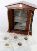 A Franklin Mint Millennium coin collection,  to include first century to twentieth century coinage