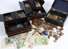 A collection of UK coins, to include some pre 1947, coppers, small collection of banknotes, housed
