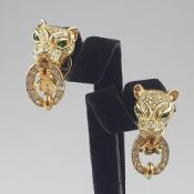 Ein Paar Vintage-Ohrclips - Metall vergoldet, in Gestalt vollrunder Pantherköpfe mit beweglichen Ma