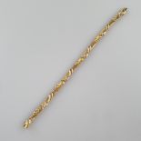 Gliederarmband mit Diamanten - Gelbgold 585/000 (14K), gestempelt / geprüft, 9 längliche Glieder mi