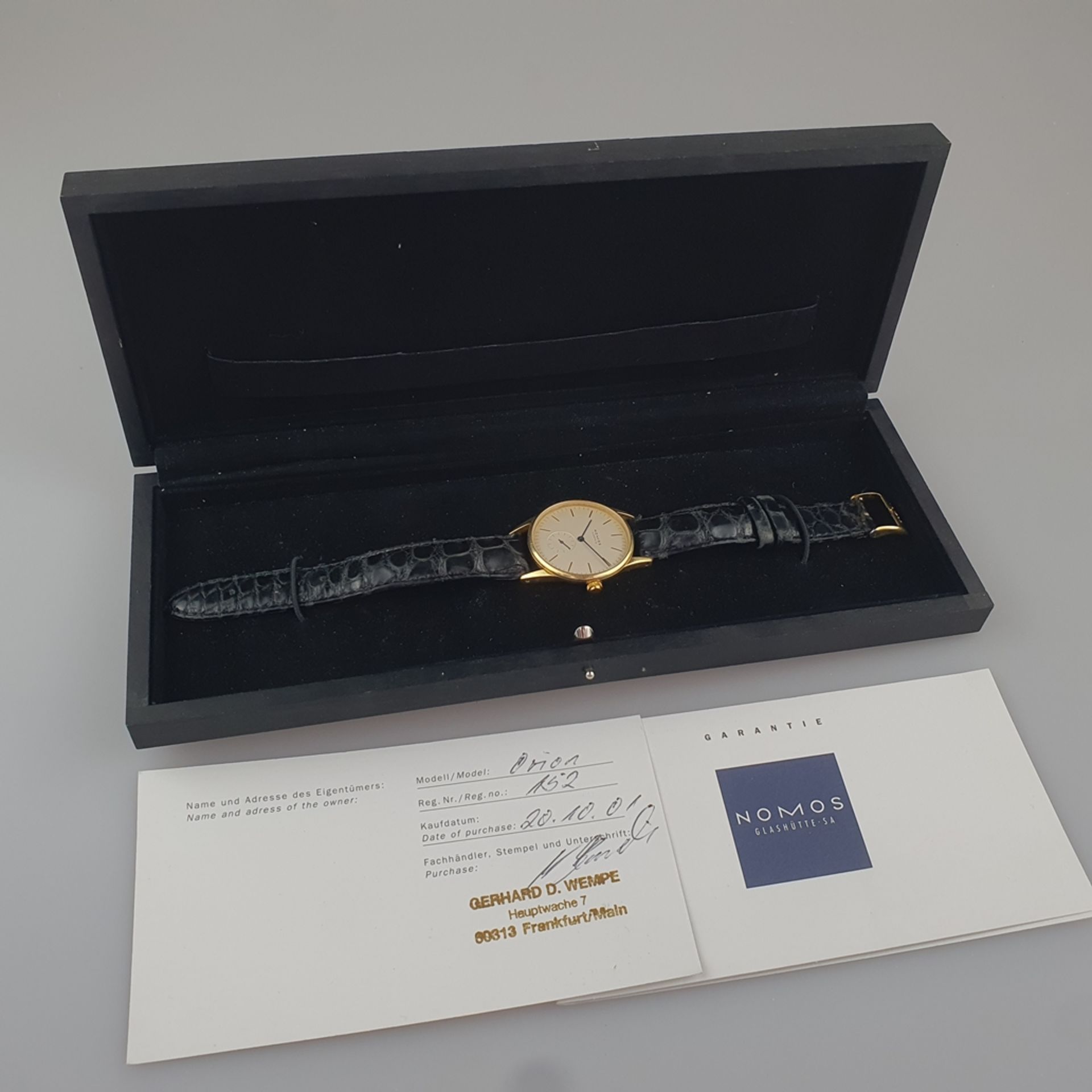 Nomos-Herrenarmbanduhr - "Orion",Gehäuse 18K Gelbgold, Handaufzug, Zifferblatt mit goldfarbenem Stu - Image 7 of 8