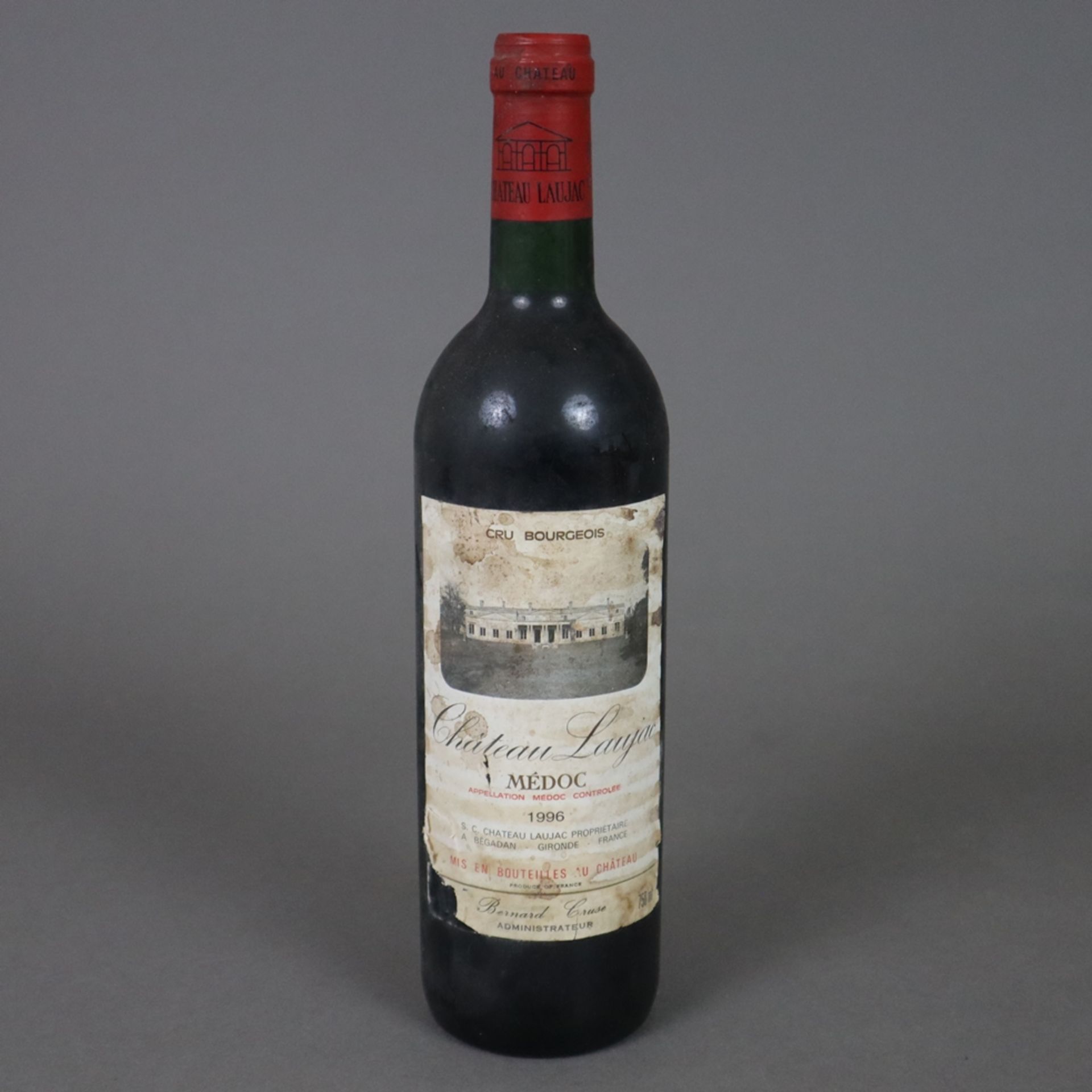 Wein - 1996 Château Laujac, Médoc, France, 0,7 L, Flasche verschmutzt, Etikett stark beschädigt