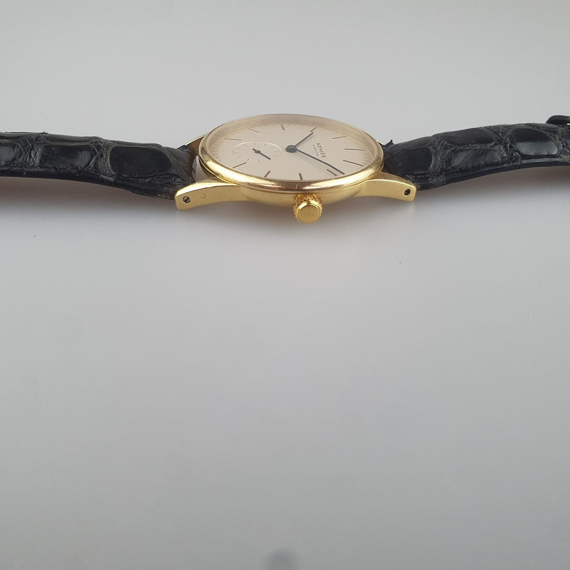 Nomos-Herrenarmbanduhr - "Orion",Gehäuse 18K Gelbgold, Handaufzug, Zifferblatt mit goldfarbenem Stu - Image 4 of 8