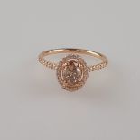 Diamantring - Roségold 750/000, zentraler Diamant im Ovalschliff von 0,54 ct. in Krappenfassung (Fa