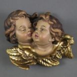 Geflügelter Putto-Doppelkopf - Holz geschnitzt, farbig und goldstaffiert, ca.9 x 10,8 cm, Metallöse