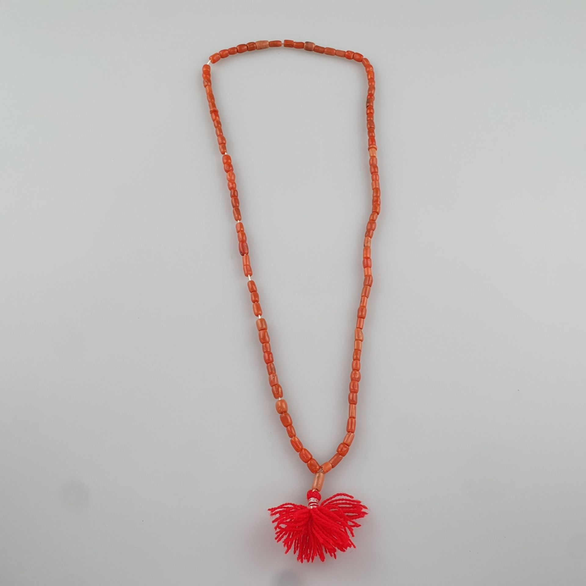 Kette aus roter Koralle / Gebetskette? - polierte Trommelstücke locker aufgefädelt, L. ca. 64 cm, G