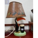 AN ORIGINAL GUINNESS TOUCAN LAMP WITH ORIGINAL SHADE - CARLTONWARE