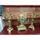 STUNNING GILT BRONZE CLOCK SET WITH FRENCH MOVEMENT ADORNED BY LION HEAD HANDLES TO EACH SIDE & WITH