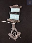 SILVER IRISH MASONIC JEWEL 'PRESENTED TO W.BRO. E.CAMPBELL BY BALLYNAHINCH M.L 301 JANUARY 1993'