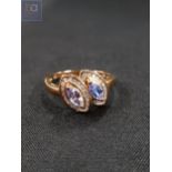 9 CARAT GOLD TANZANITE AND DIAMOND RING