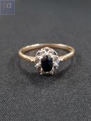 9 CARAT GOLD DIAMOND AND SAPPHIRE RING