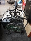 WROUGHT IRON WINE BOTTLE HOLDER AND 2 CAST IRON TRIVETS
