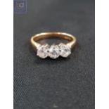 18 CARAT GOLD 3 STONE DIAMOND RING WITH 1 CARAT OF DIAMONDS