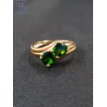 9 CARAT GOLD 2 GREENSTONE RING