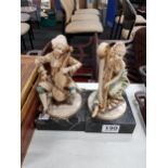 PAIR OF MUSICAL FIGURES ON MARBLE BASE