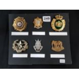 SHEET OF MILITARY BADGES