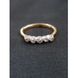 5 STONE 18 CARAT GOLD RING (4 DIAMONDS)