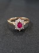9 CARAT RUBY AND DIAMOND RING