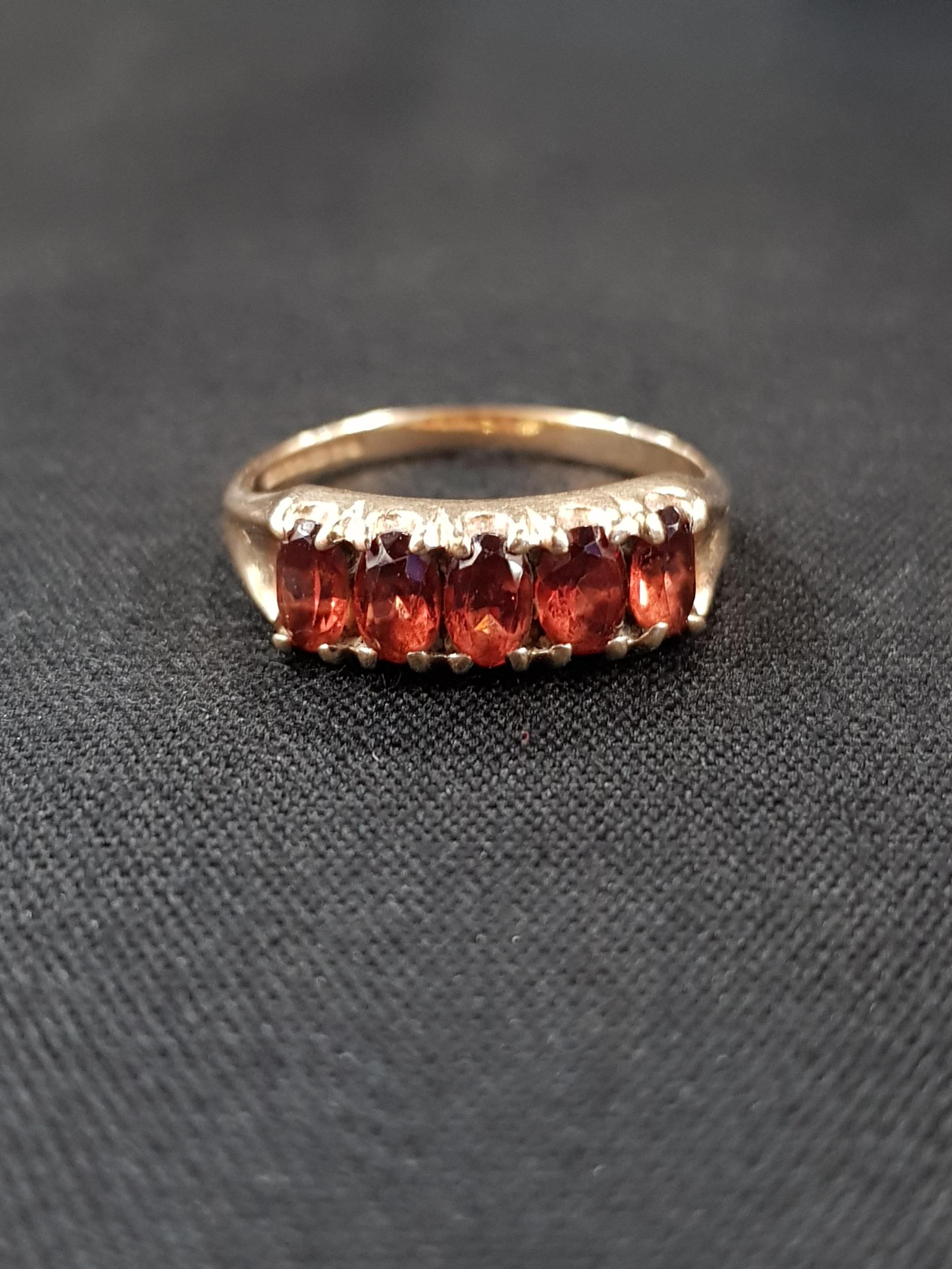 9 CARAT GOLD GARNET RING