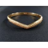 SOLID 18 CARAT GOLD AND DIAMOND BANGLE CIRCA 33.8G