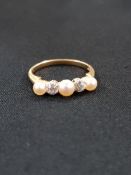 ANTIQUE 18 CARAT GOLD 2 STONE DIAMOND AND 3 PEARL RING