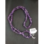 LONG STRING OF AMETHYST GLASS BEADS